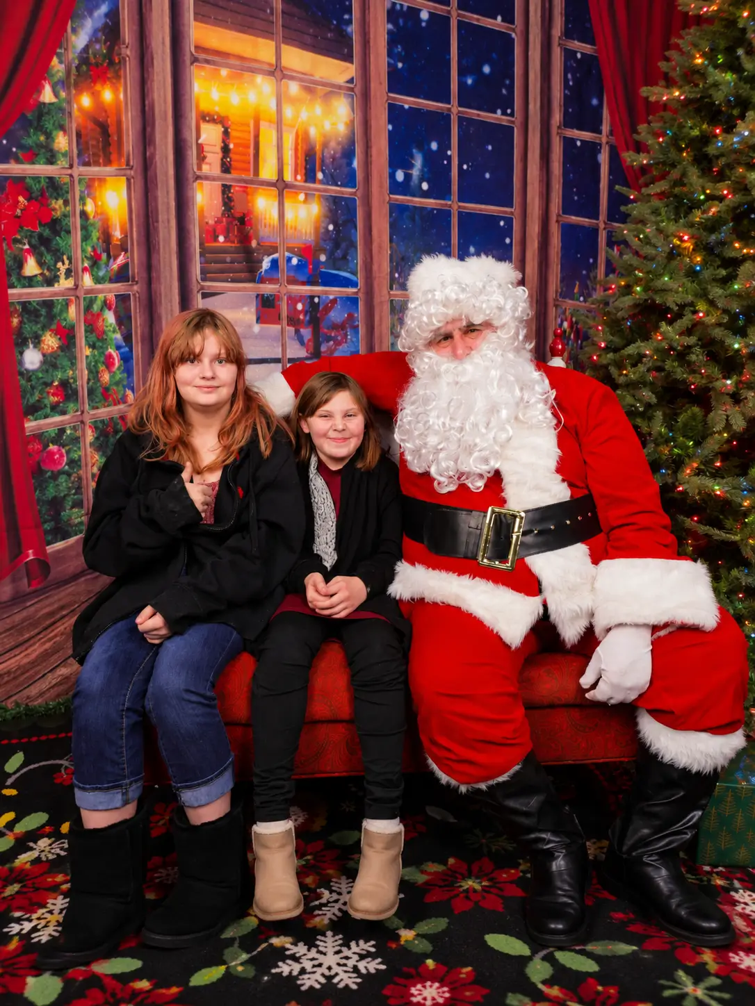 Festive Christmas Portrait with Santa and Girls