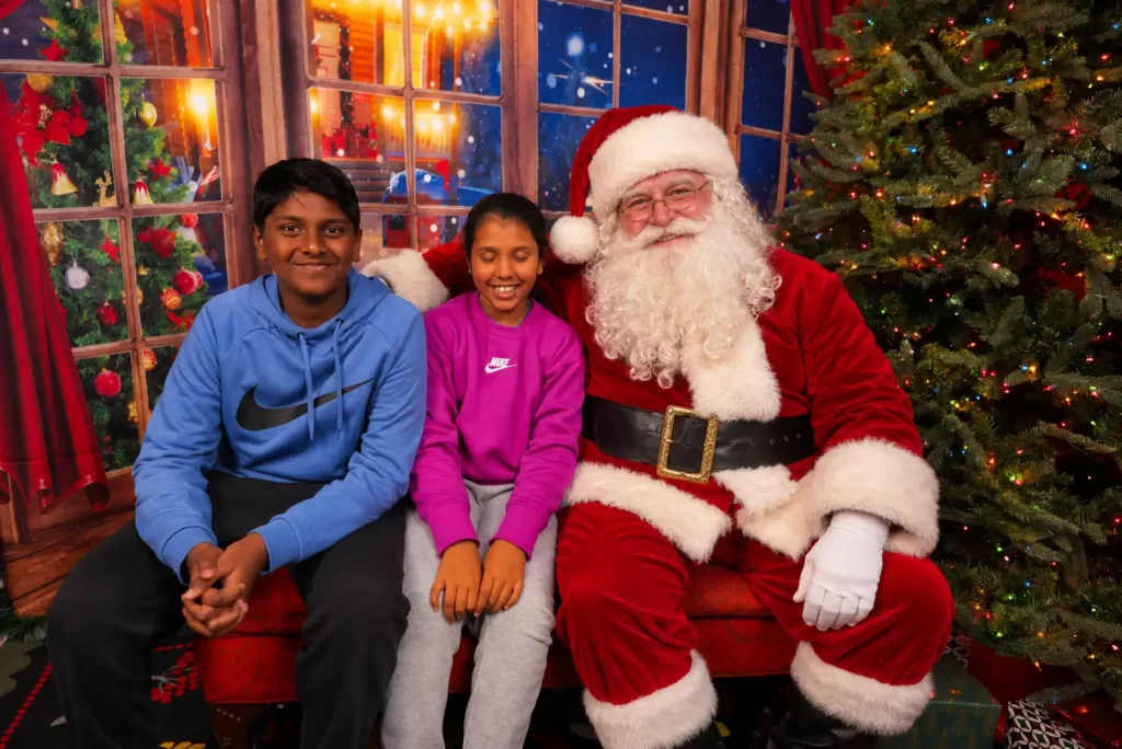 Festive Family Portrait with Santa